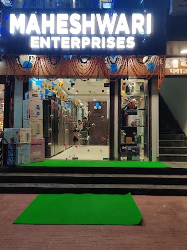 Radha Plaza Showroom entrance at night